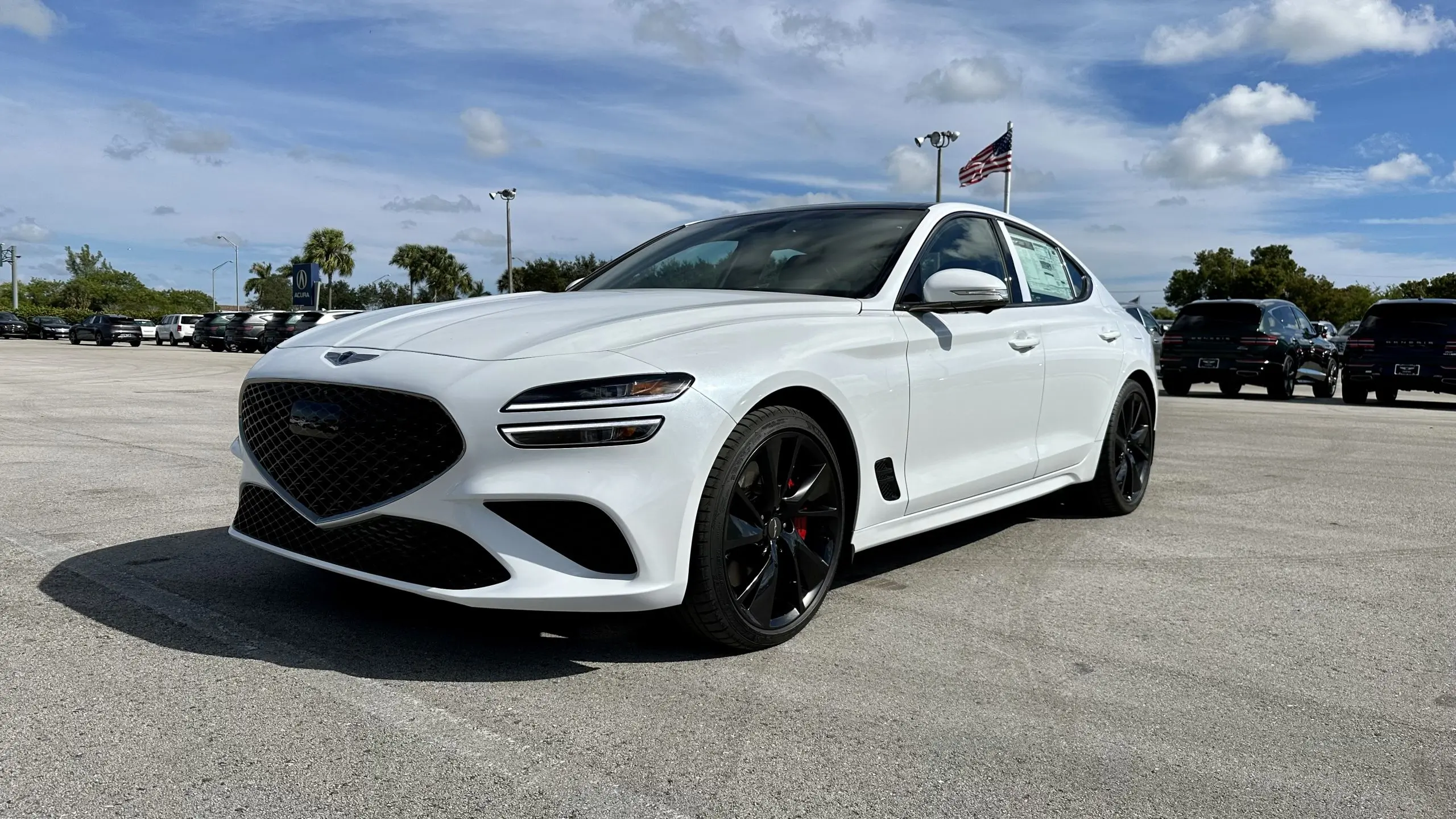 2023-Genesis-G70-White-exterior-front-side-scaled