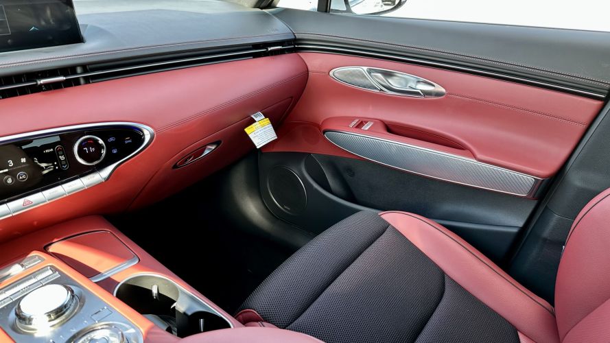 2023 Genesis GV70 - interior passenger red black leather