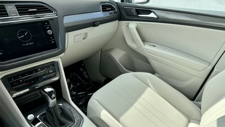 2023 VW Tiguan SEL - interior passenger white leather
